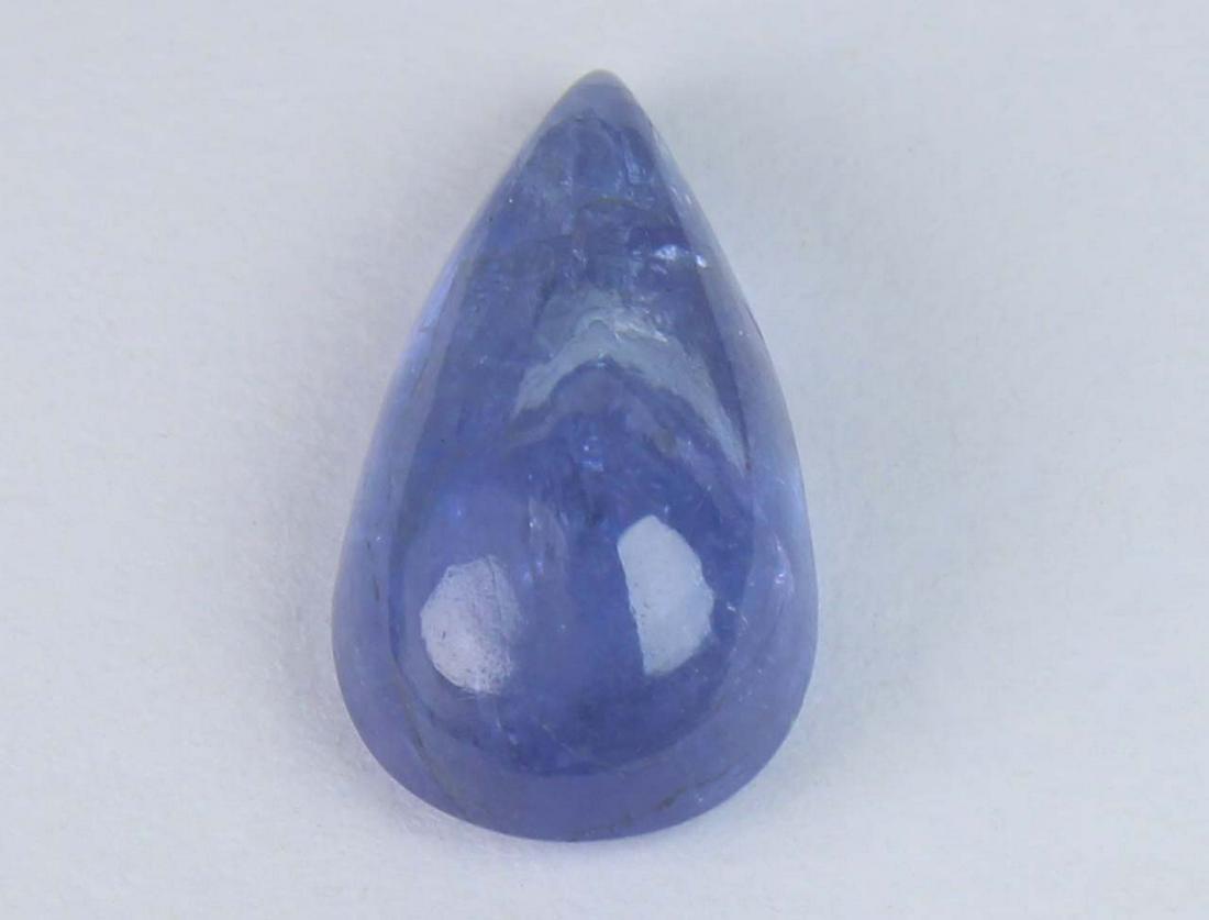 3.00 Cts Natural Tanzanite: No Reserve! Title: 3.00 Cts Natural Tanzanite Additional Information: Gemstone : Natural Tanzanite Shape and cut : Pear Cabochan Weight : 3.00 Carats Measurements : 12x7 mm Color : Violet Transprancy 