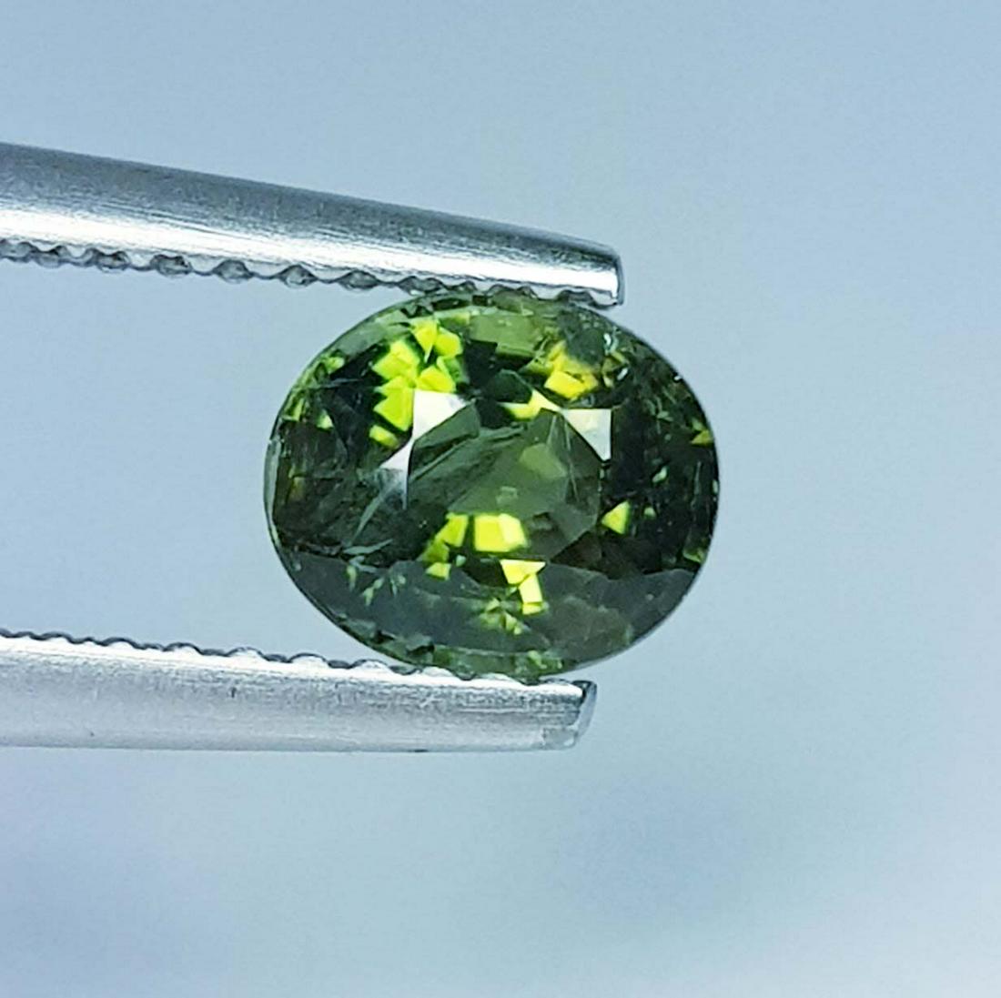 0.85 Ctz Natural Green Tourmaline: No Reserve! Title: 0.85 Ctz Natural Green Tourmaline Color/Clarity: Green / VVS-VS Gemstones: Tourmaline Carat Weights: 0.85 6.30 x 5.50 x 4.00 Additional Information: Oval / Nigeria Shipping: Domesti