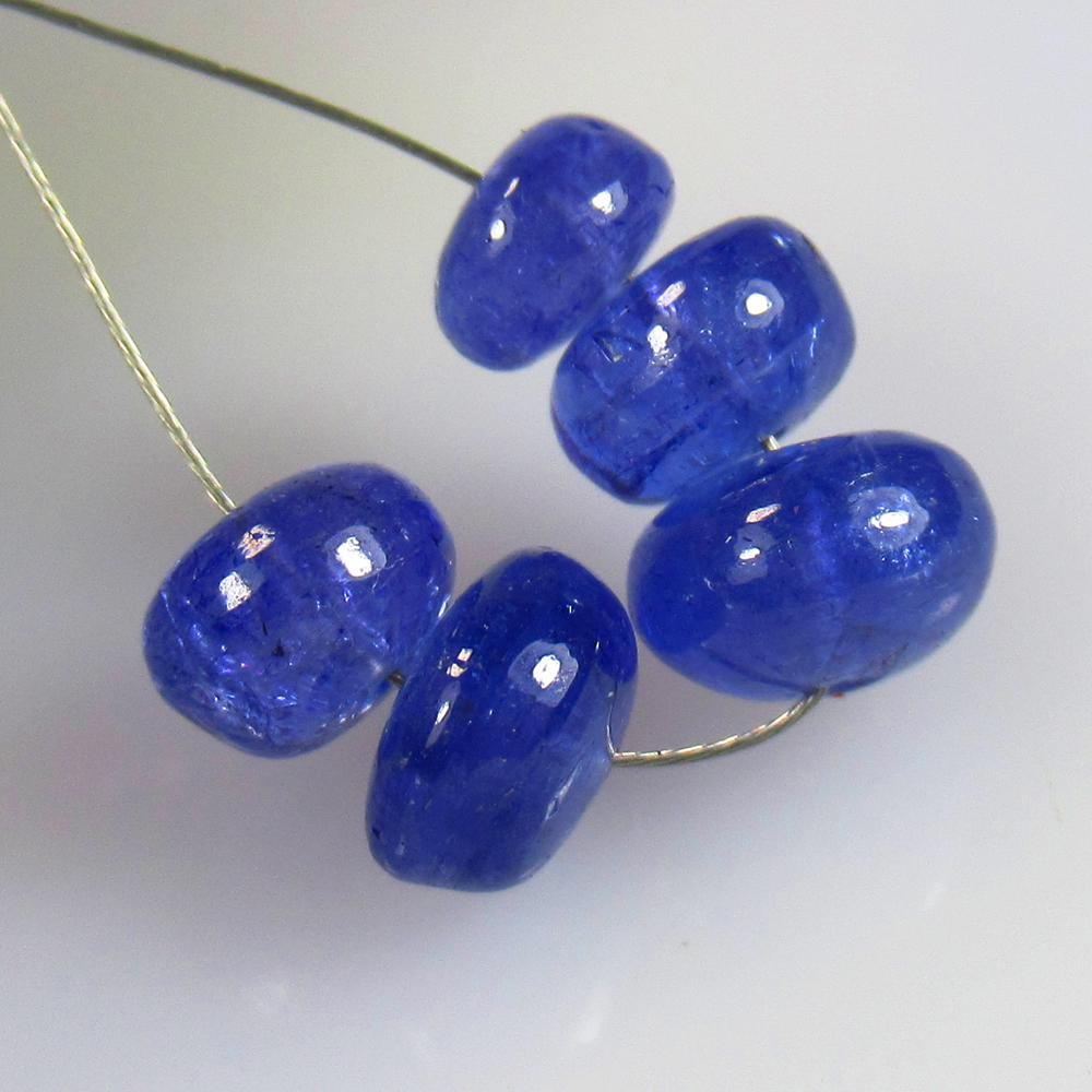 9.20 Ctw Natural 5 Drilled Tanzanite Round Ball Beads: No Reserve! Title: 9.20 Ctw Natural 5 Drilled Tanzanite Round Ball Beads Stone Clarity: Transparent Gemstones: Natural Tanzanite Beads Carat Weights: 9.2 Size/Dimensions: 5.80 - 7.50 mm / 5 PC's Addit