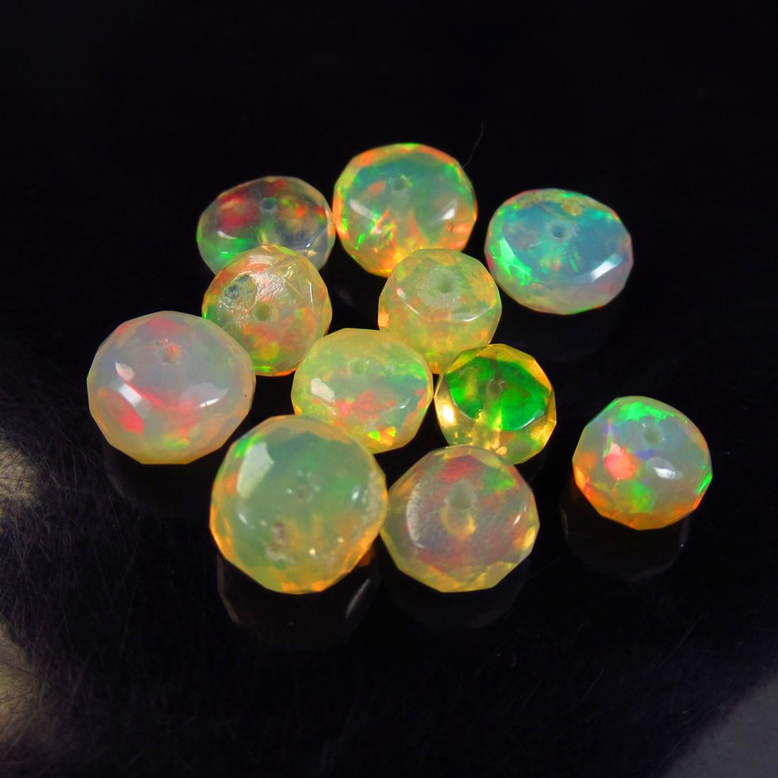 5.40 Ctw Natural 11 Drilled Faceted Fire Opal Beads: No Reserve! Title: 5.40 Ctw Natural 11 Drilled Faceted Fire Opal Beads Stone Clarity: Transparent Gemstones: Faceted Fire Opal Beads Carat Weights: 5.4 Size/Dimensions: 4.40 to 6.10 mm / 11 PC's Addit