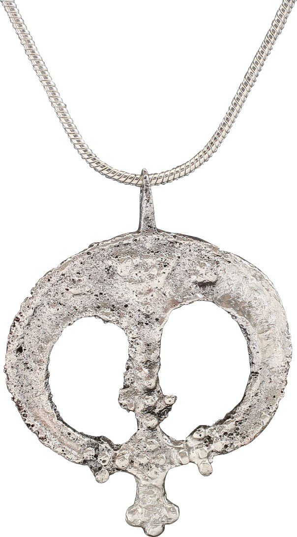 VIKING LUNAR ASTROLOGICAL AMULET, 9th-10th CENTURY: Silvered bronze, just over 1” width. The crescent moon with the tips converging and each as three spheres. Further central projection with triple spherical terminals, above and below. That confi