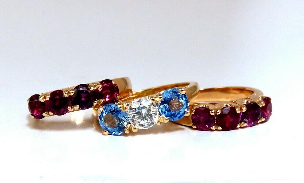 5.60ct Natural Ruby Sapphire Stackable Stacking Bands 14 Karat: stackable Rings 3.50ct. round cut Natural Rubies, 1.60ct (2) Sapphires .50ct Diamond G-color Vs-2 Clarity Three rings. (VS) Clean Clarity Transparent & Vivid colors. 14kt yellow gold 11.6 grams. Rings