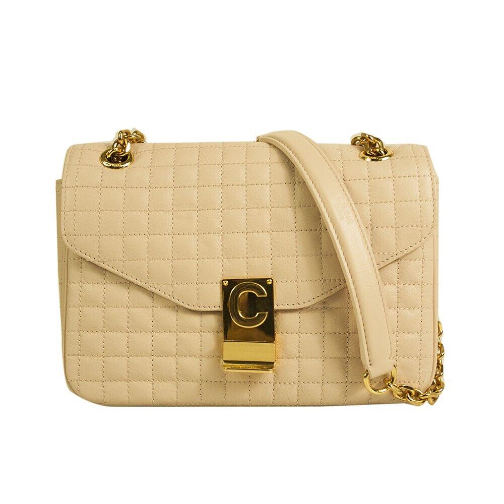 Celine square-quilt flap classic shoulder bag in powder pink leather & gold hrw: Celine square-quilt flap classic shoulder bag in powder pink leather & gold hardware This stylish handbag is a stunning Celine medium classic bag. It is impeccably designed in powder pink square quilt