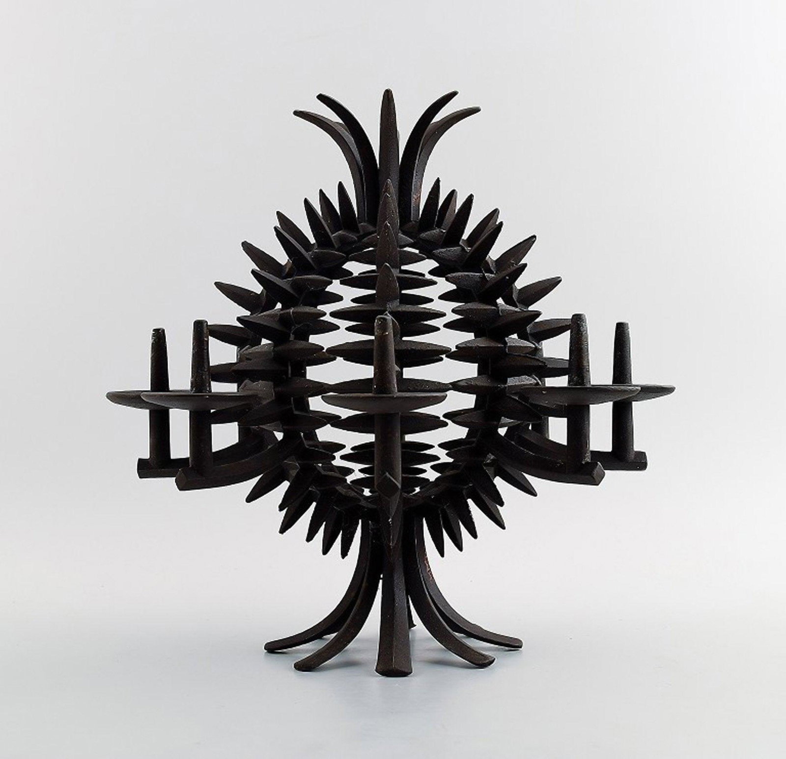 Jens H. Quistgaard: b. Copenhagen 1919, d. 2008. A circular, pineapple shaped candlestick of (1 of 8)