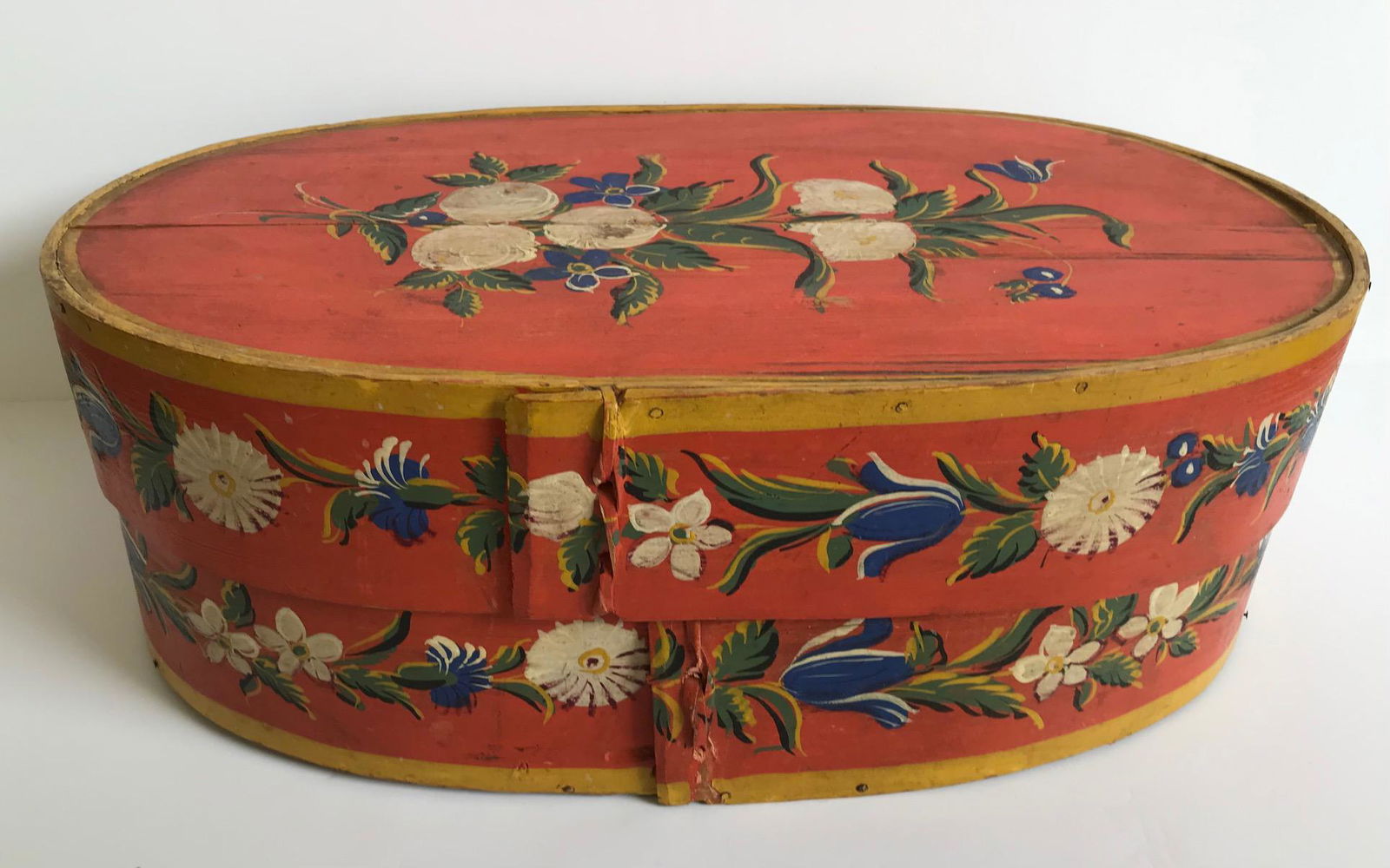 19th Century Bride’s Box: Attractive wooden box with hand painted decoration, probably of Northern European origin. Measures 17” long by 10” wide by 7” tall and is in very good condition, with wear consistent