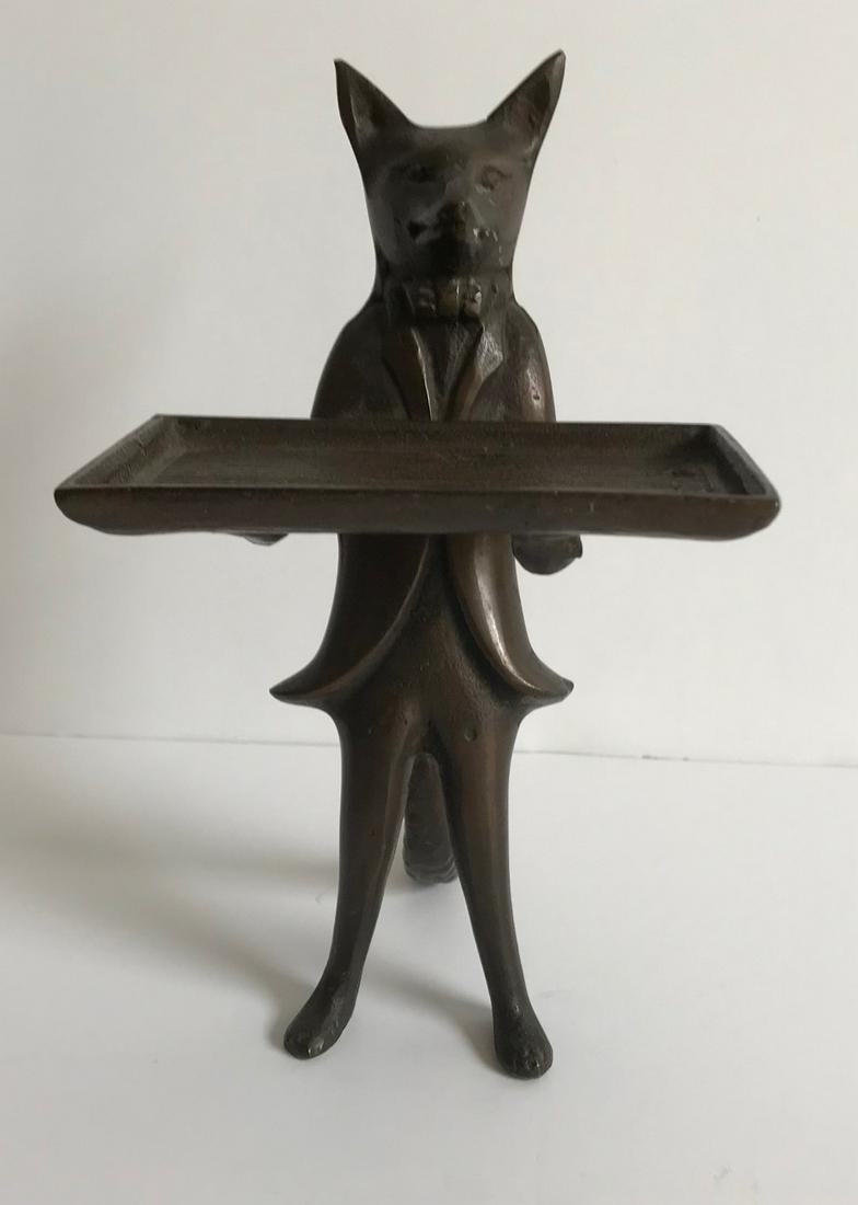 Art Nouveau Card Holder: Smartly dressed fox, serving as a card holder. Made of bronze and dating to the 1920s, it would look great on your desk with your business cards. Stands 6.5” tall. Shipping: Domestic: Flat-rate 