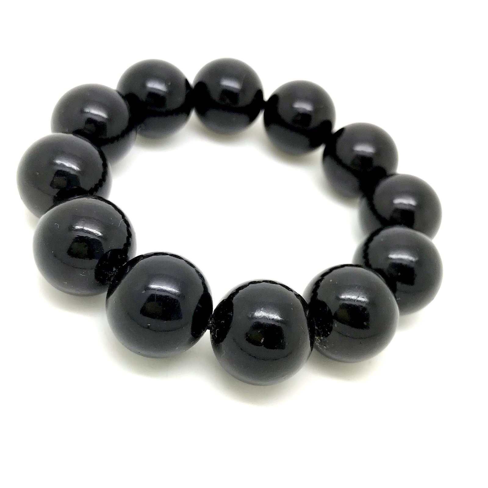 Fascinating Amber Bracelet made from Round Amber beads: Title: Fascinating Amber Bracelet made from Round Amber beads Metal: None Gemstones: Amber Weight: 27.8 g Size: Bead size: 16.0 mm Bead size: 0.63 inches Made of: Reconstituted Amber Additional Inform