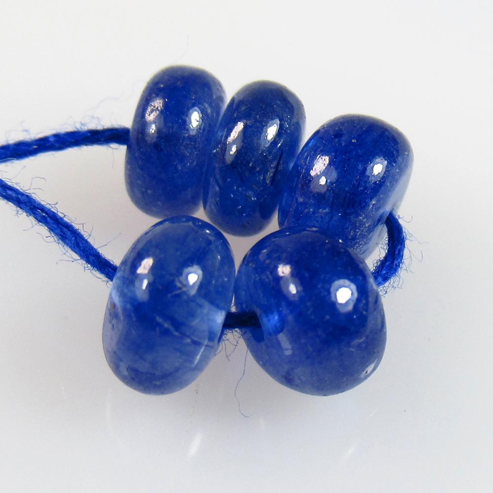8.42 Ctw Natural 5 Drilled Tanzanite Round Beads: No Reserve! Title: 8.42 Ctw Natural 5 Drilled Tanzanite Round Beads Stone Clarity: Transparent Gemstone: Natural Tanzanite Beads Carat Weight: 8.42 Size/Dimensions: 6.10 - 6.40 mm / 5 Pc's Additional 