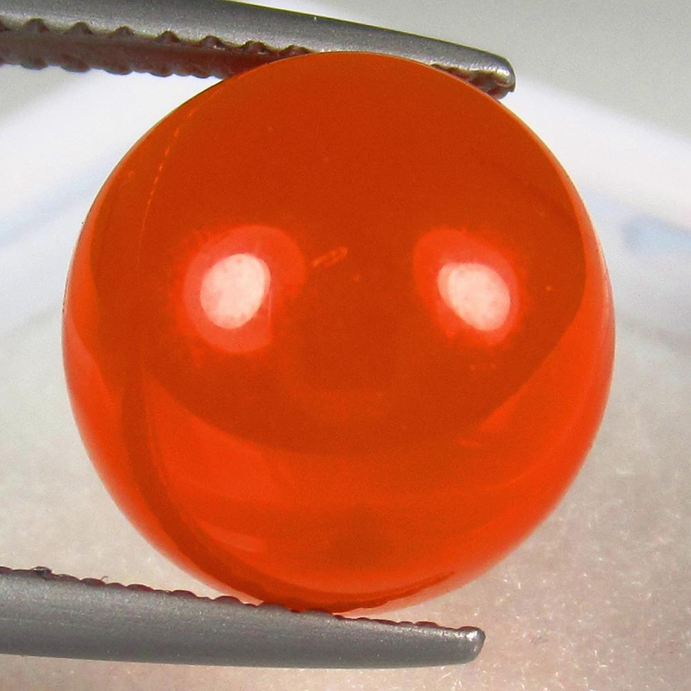 Natural Carnelian - 6.68 Ct: No Reserve! Title: Natural Carnelian - 6.68 Ct Origin: Brazil Weight: 6.68 Size/Dimensions: 11.0 x 11.0 x 7.6 mm Additional Information: Pieces : 1 No's / Shape : Round Cab / Color : Orange / Clarity 