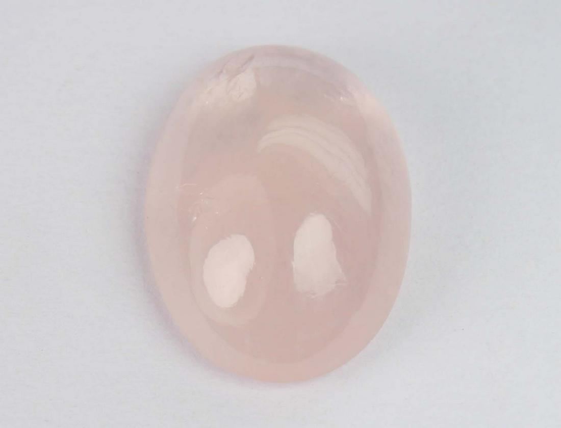5.20 cts Natural Morganite: No Reserve! Title: 5.20 cts Natural Morganite Description: Gemstone : Natural Morganite Shape and Cut : Oval Cabochon Weight : 5.20 carats Measurements : 14x10 mm Color : Peach Transparency : Transpar