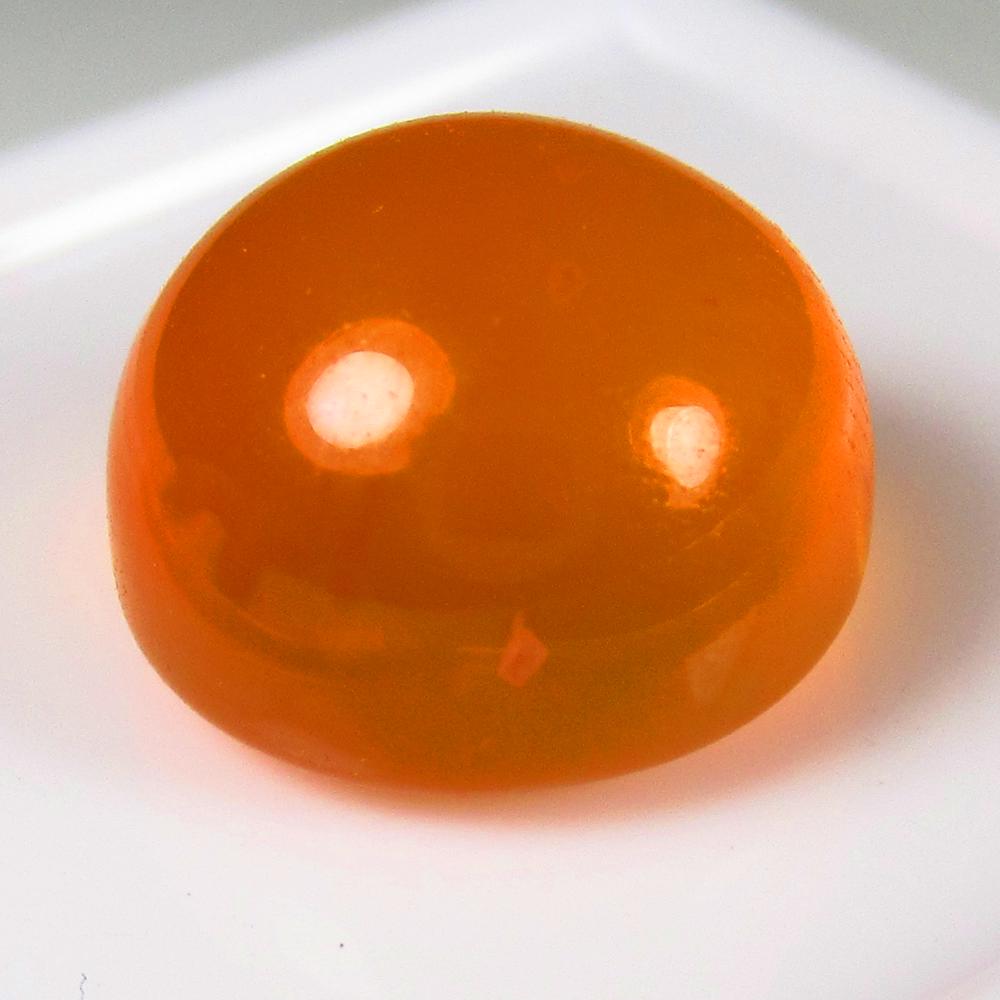 Natural Carnelian - 7.20 Ct: No Reserve! Title: Natural Carnelian - 7.20 Ct Origin: Brazil Weight: 7.2 Size/Dimensions: 11.3 x 11.3 x 7.8 mm Additional Information: Pieces : 1 No's / Shape : Round Cab / Color : Orange / Clarity :
