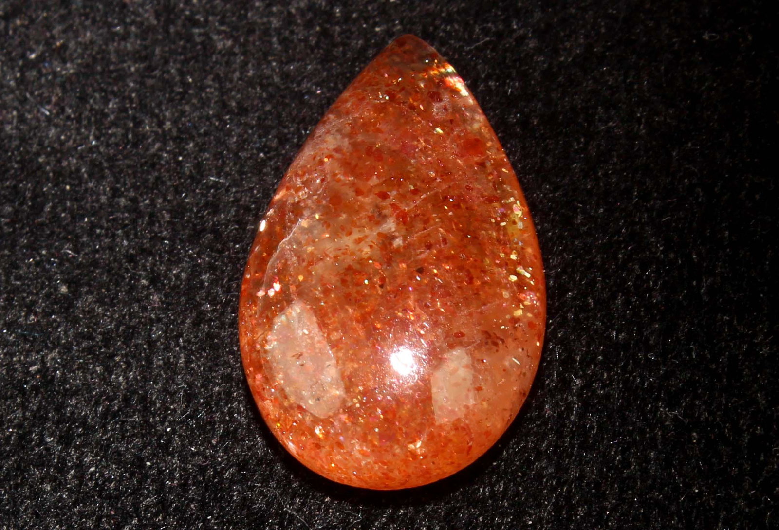 7.30 Cts Natural Sunstone: No Reserve! Title: 7.30 Cts Natural Sunstone Description: Gemstone : Natural Sunstone Origin : Africa Weight : 7.30 Carats Dimensions : 18.17x11.42x5.40 mm Shape : Pear Cabochon Color : Orange Treatme