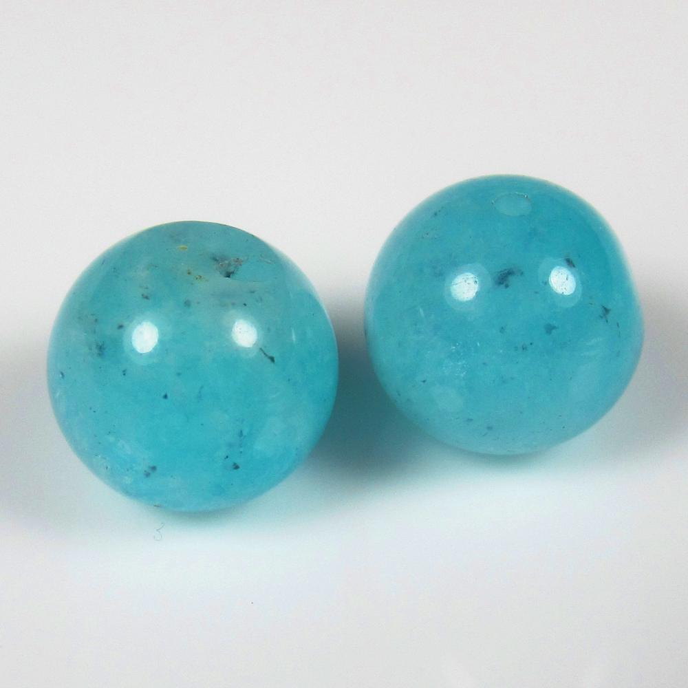 Natural Amazonite Beads - 10.68 Ct: No Reserve! Title: Natural Amazonite Beads - 10.68 Ct Origin: Brazil Weight: 10.68 Size/Dimensions: 9.5 x 9.5 mm Additional Information: Pieces : 2 No's / Shape : Round Drilled / Color : Blue / Clarit