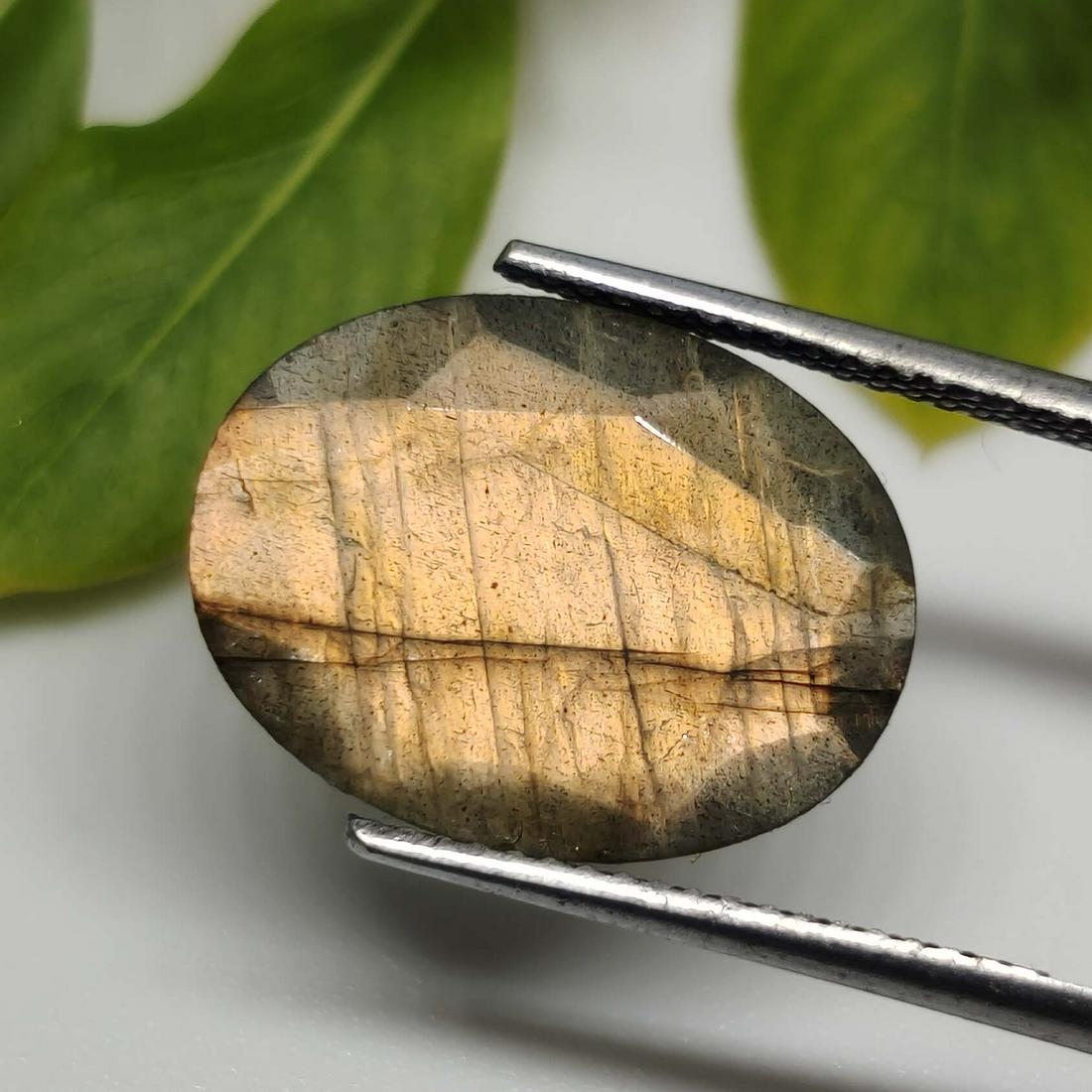 7 ct Natural Faceted Labradorite: No Reserve! Title: 7 ct Natural Faceted Labradorite Additional Information: Gemstones: Labradorite Carat Weights: 7 ct Size/Dimensions: 16 X12 X 6 mm Origin : Labrador Materials & Techniques: Labrador