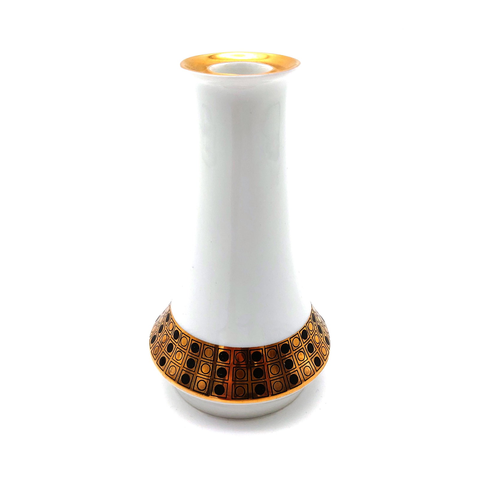 Royal Dux - Brussels candlestick: Title: Royal Dux - Brussels candlestick Date/Period: 1960-1978 Dimension: height 14,5 cm Materials: porcelain with glaze Provenance: White Brussels-style candle holder with gold and black beads, model