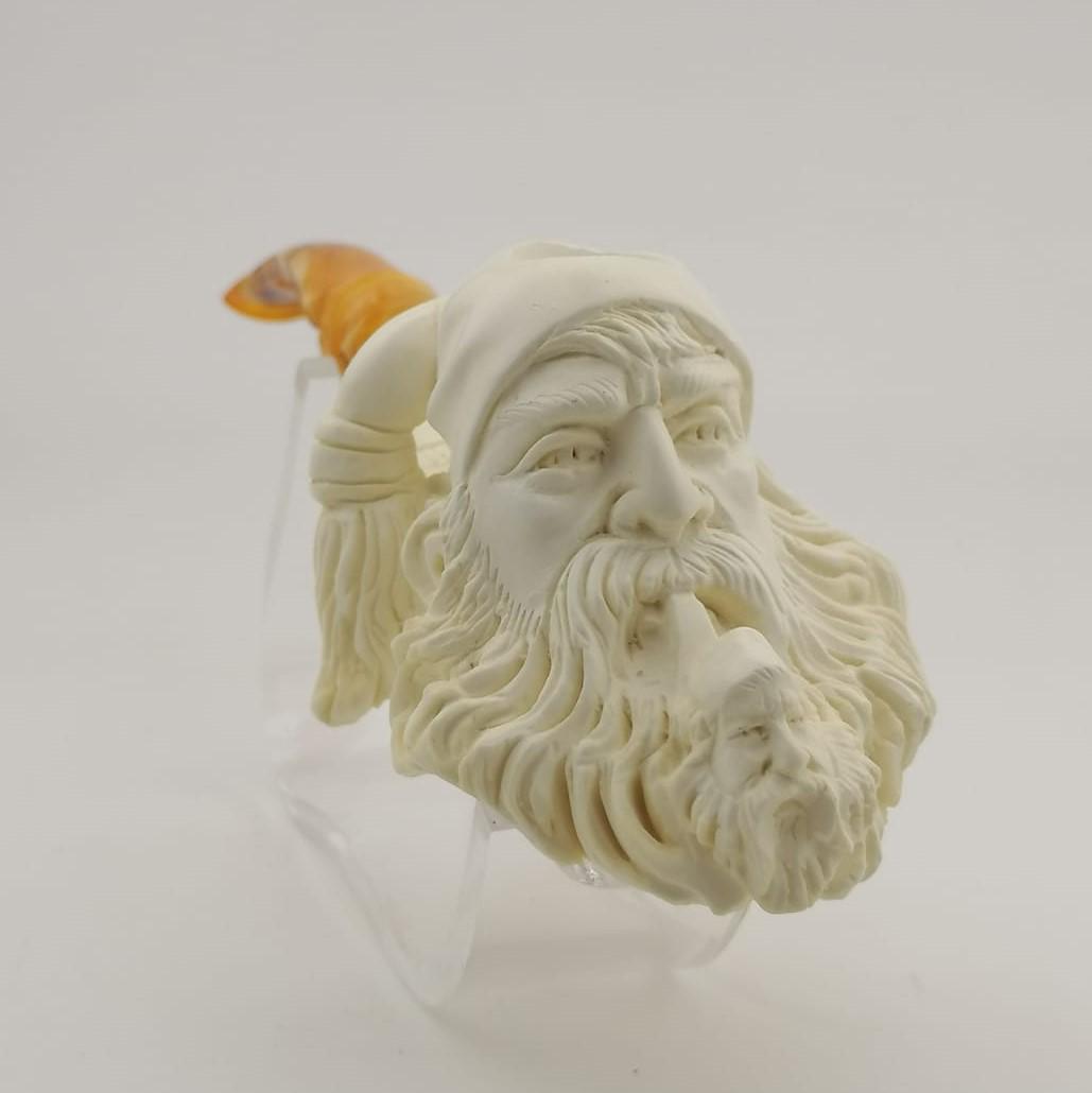 Dunhill Meerschaum Pipe: Title: Dunhill Meerschaum Pipe Materials: Meerschaum Dimension: 6.6 inch (17cm) Additional Information: Dunhill,Hand carved Meerschaum Pipe. It is not a Dunhill brand product,because of the cover imag