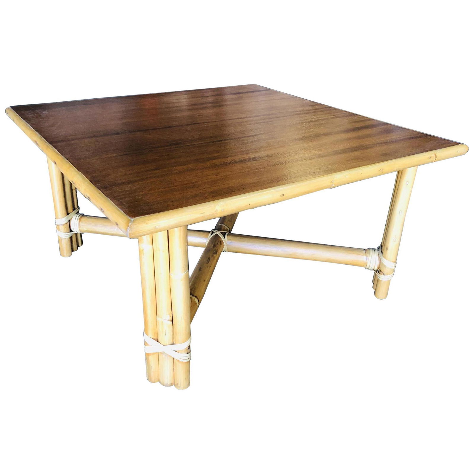 Restored "X" Base Rattan Coffee Table with Mahogany Top: Vintage 1940s rattan coffee/corner table with wonderful stacked base, stylized cut-out slat sides and a beautiful dark stained mahogany top. This table is a great match for midcentury rattan and Paul