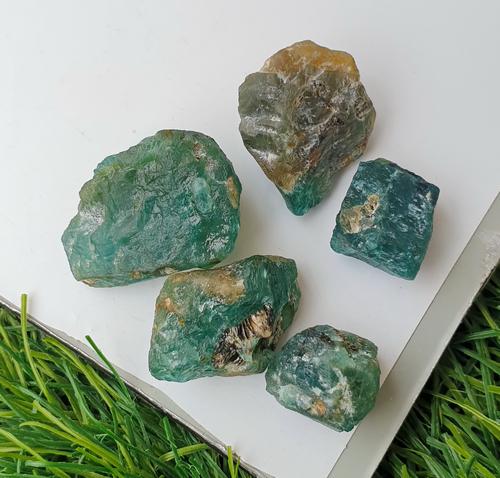 Natural & Unheated~ Blue Grandidierite Rough Lot: Title: Natural & Unheated~ Blue Grandidierite Rough Lot Color/Clarity: Blue Gemstone Type: Rough Carat Weights: 54.80 Cts Size/Dimensions: 19x14x10 mm Reserve: $15.00 Shipping: Domestic: Flat-rate of 