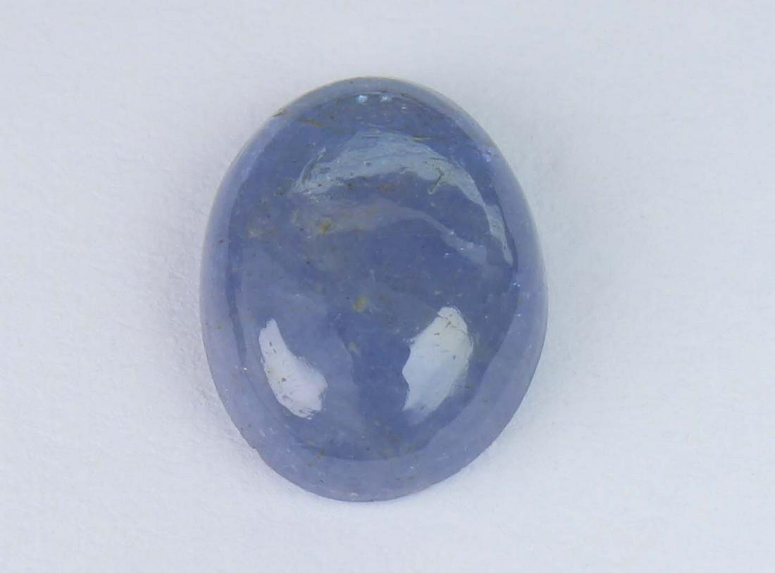 3.50 Cts Natural Tanzanite: No Reserve! Gemstone : Natural Tanzanite Shape and cut : Oval Cabochan Weight : 3.50 Carats Measurements : 11.08x8.60x3.90 mm Color : Violet Transprancy : Transparent Treatment : No Treatment Origin :