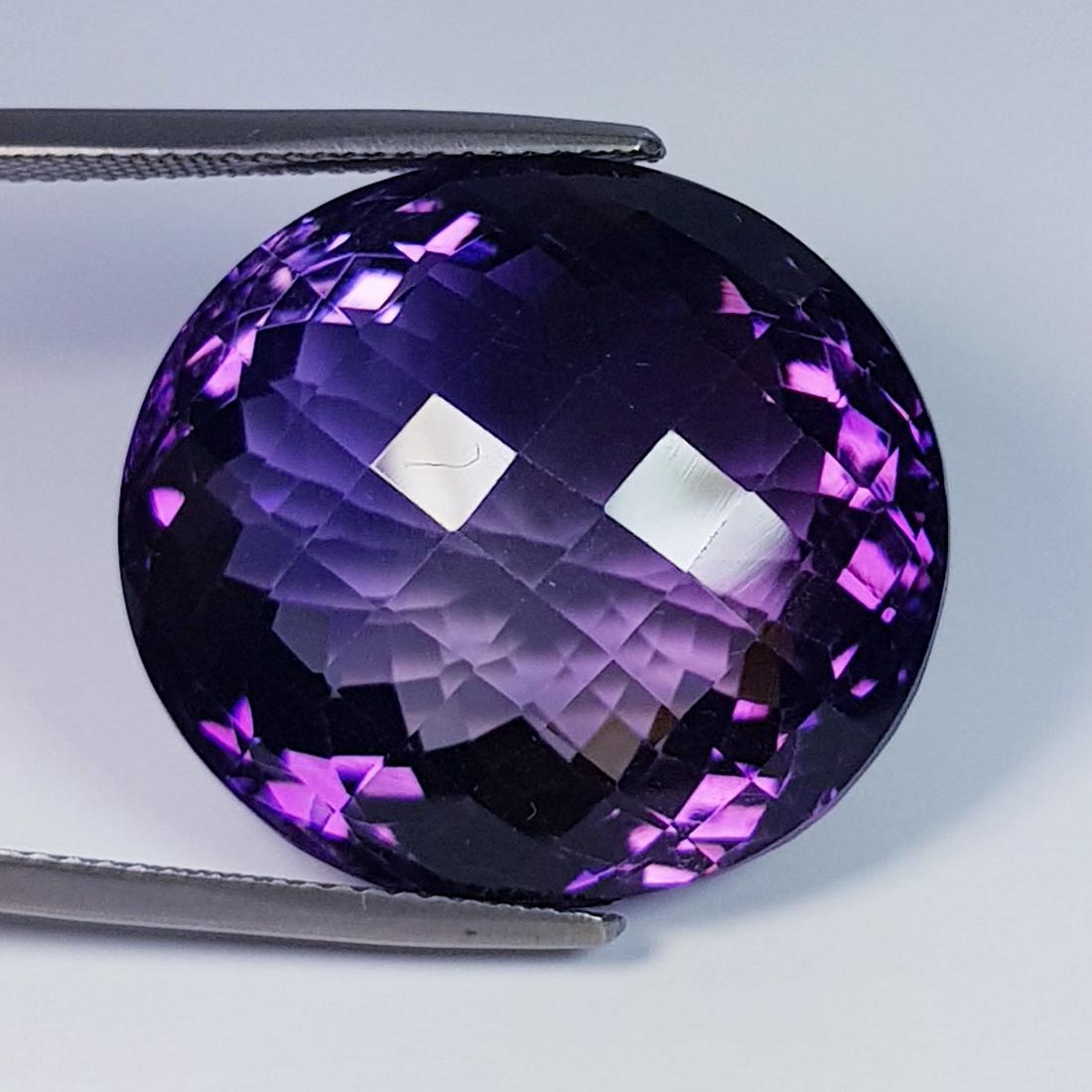 41.66 ctz" AAA Top Grade Gem" Natural Purple Amethyst: No Reserve! Title: 41.66 ctz" AAA Top Grade Gem" Natural Purple Amethyst Color/Clarity: AAA Purple / IF Gemstones: Amethyst Carat Weight: 41.66 Size/Dimensions: 22.73 x 20.87 x 14.40 Additional Inform