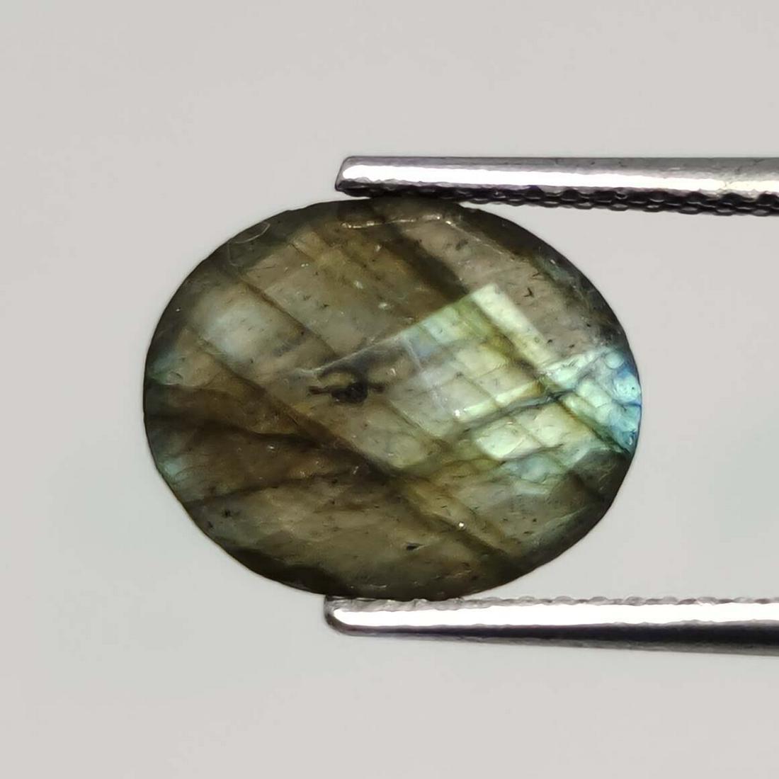3.65 ct Natural Faceted Labradorite: No Reserve! Title: 3.65 ct Natural Faceted Labradorite Additional Information: Gemstones: Labradorite Carat Weights: 3.65 ct Size/Dimensions: 11 x 9 mm Origin : India Materials & Techniques: Labradori