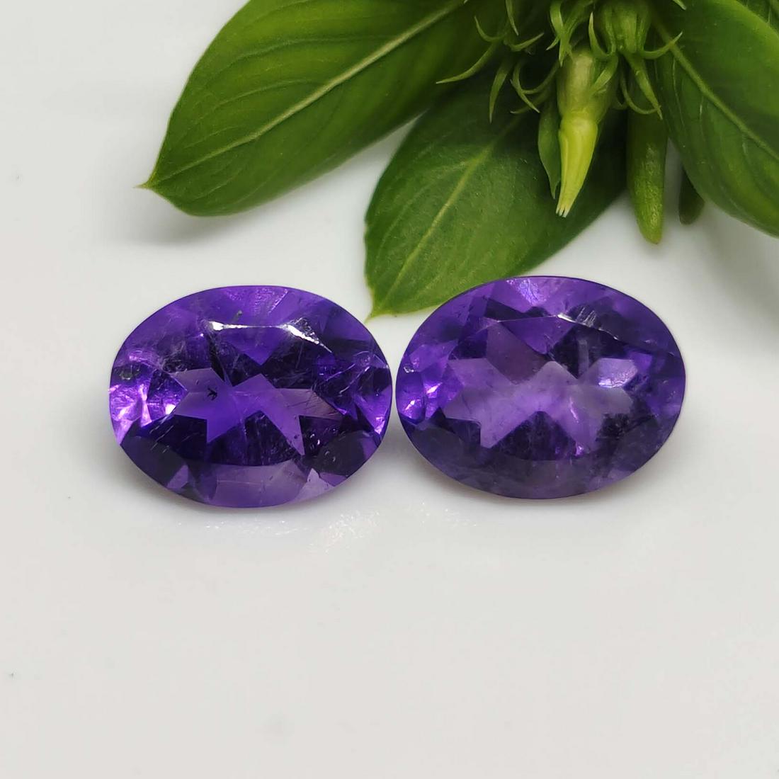 3.30 ct Natural Brazilian Purple Amethyst Pair: No Reserve! Title: 3.30 ct Natural Brazilian Purple Amethyst Pair Additional Information: Gemstones: Amethyst Carat Weights: 3.30 ct Size/Dimensions: 9 X 7 X 5 mm Origin : Brazil Materials & Technique