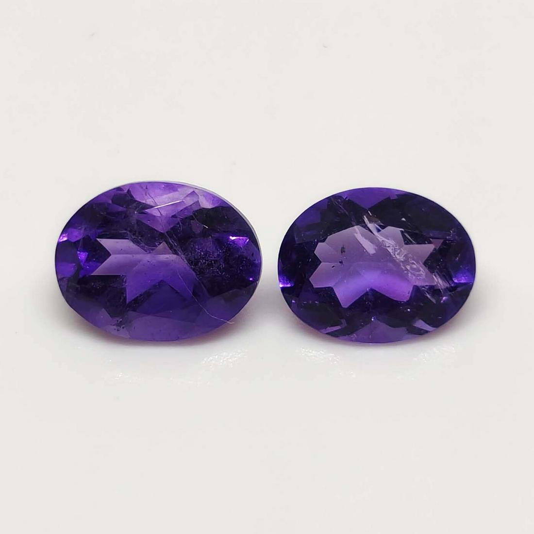 3.30 ct Natural Purple Amethyst Pair: No Reserve! Title: 3.30 ct Natural Purple Amethyst Pair Additional Information: Gemstones: Purple Amethyst Carat Weights: 3.30 ct Size/Dimensions: 9 X 7 mm Origin : Brazil Materials & Techniques: Amet