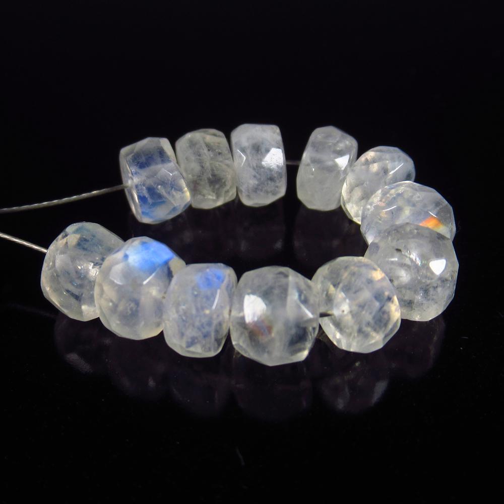 Natural Blue Moonstone Beads - 12.10 Ct: No Reserve! Title: Natural Blue Moonstone Beads - 12.10 Ct Origin: India Weight: 12.1 Size/Dimensions: 6.0 - 6.5 mm Additional Information: Pieces : 12 No's / Shape : Round Drilled / Color : Blue Tint