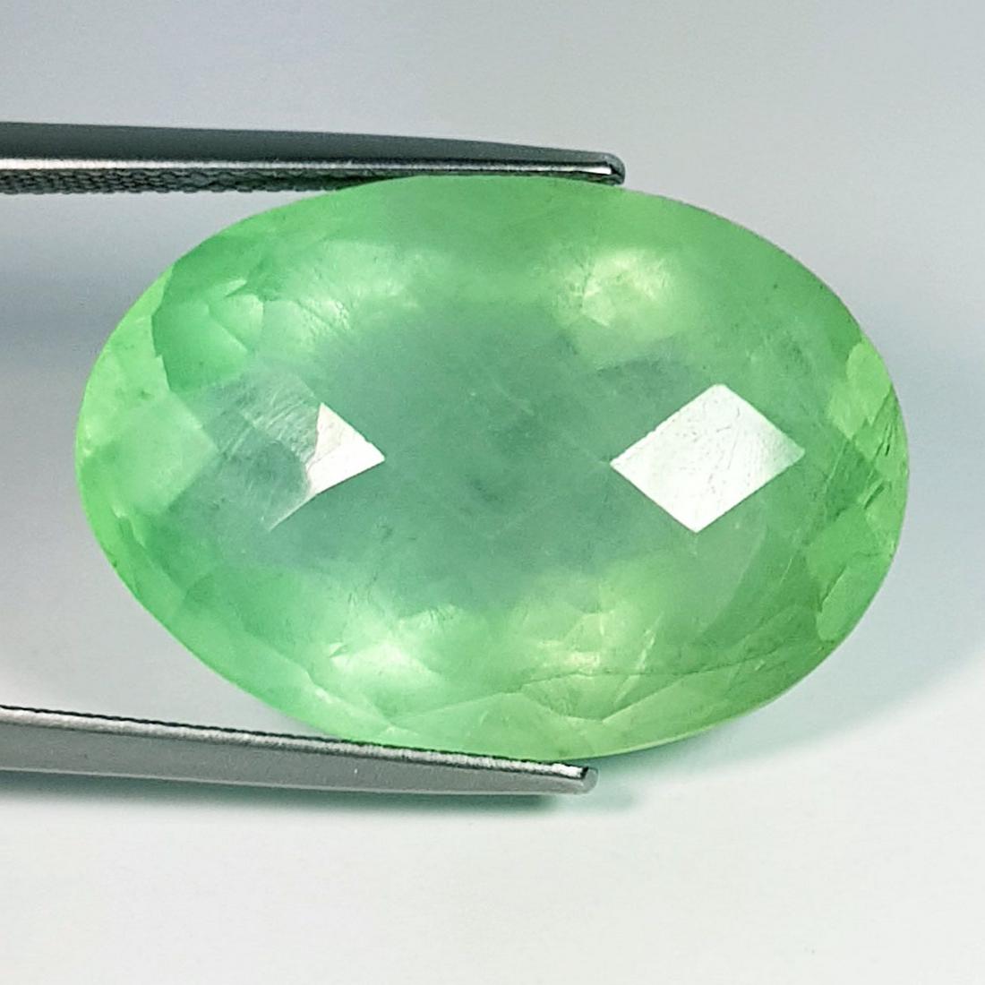 45.11 ctz" Rare Colombian Green Gem" Natural Fluorite: No Reserve! Title: 45.11 ctz" Rare Colombian Green Gem" Natural Fluorite Color/Clarity: Green / VS Gemstones: Fluorite Carat Weight: 45.11 Size/Dimensions: 25.42 x 18.03 x 14.16 Additional Information