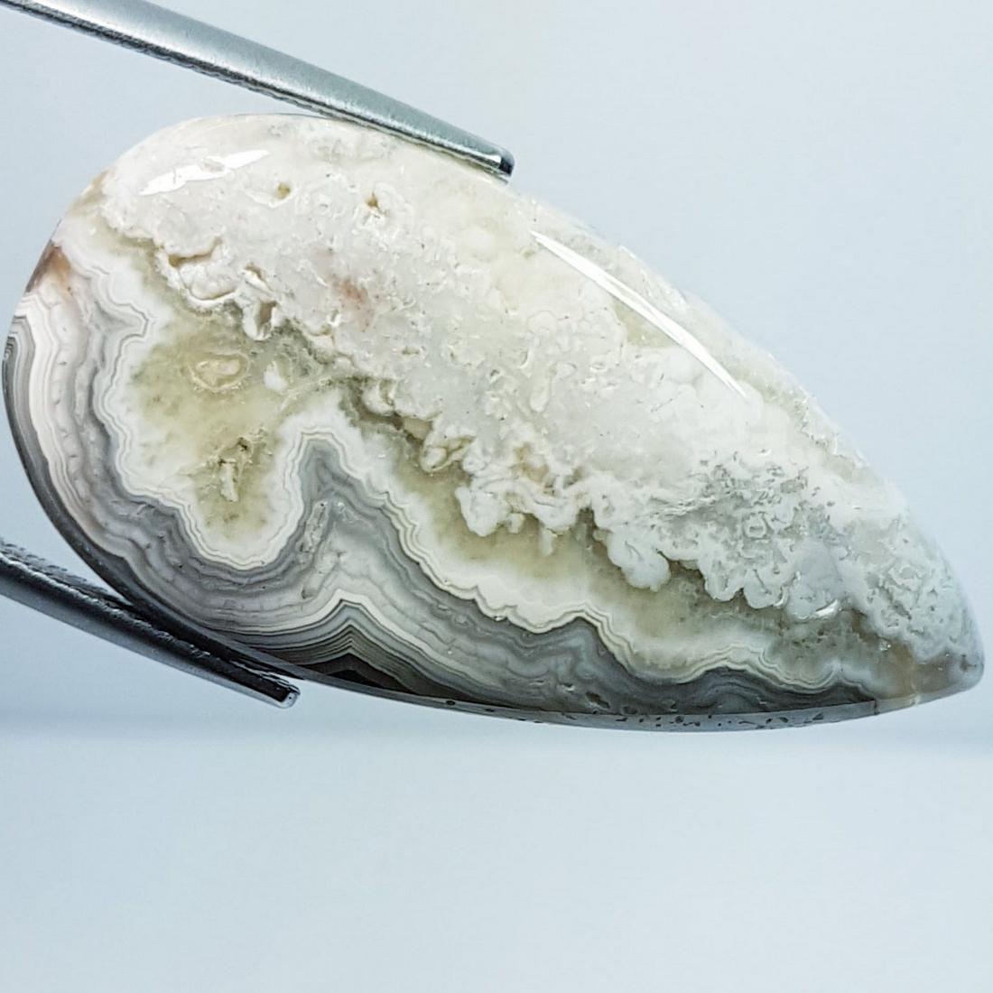 33.21 ctz Natural Crazy Lace Agate: No Reserve! Title: 33.21 ctz Natural Crazy Lace Agate Color/Clarity: Multy Color / Opaque Gemstones: Agate Carat Weight: 33.21 Size/Dimensions: 36.14 x 19.36 x 6.09 Additional Information: pear / Braz
