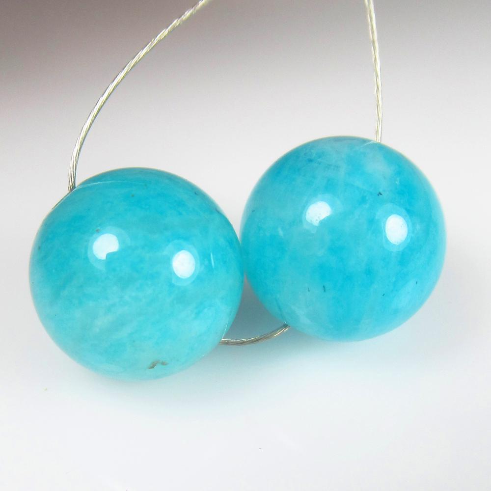 Natural Amazonite Beads - 10.91 Ct: No Reserve! Title: Natural Amazonite Beads - 10.91 Ct Origin: Brazil Weight: 10.91 Size/Dimensions: 10.0 x 10.0 mm Additional Information: Pieces : 2 No's / Shape : Round Drilled / Color : Blue / Clar