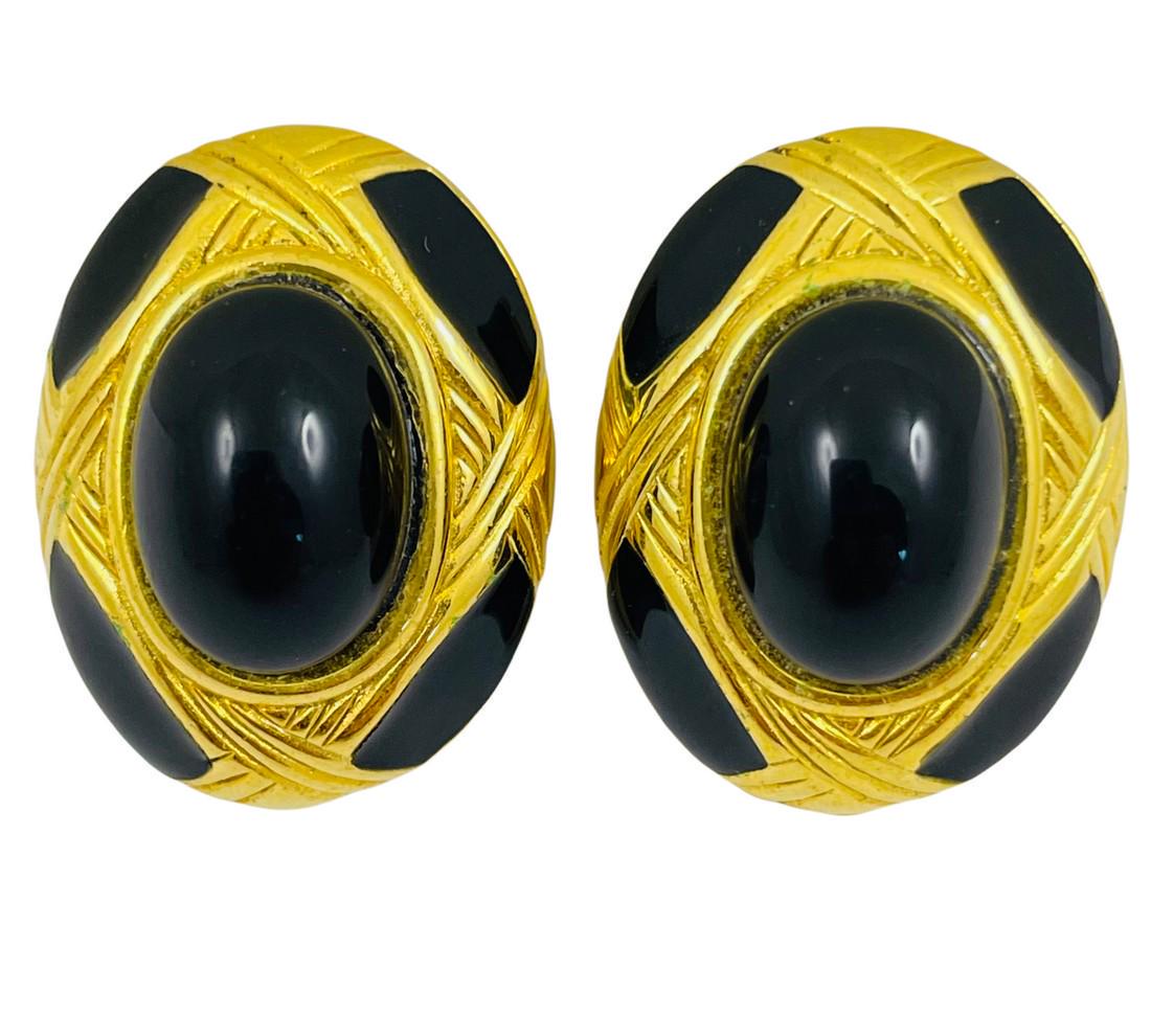Vintage gold black enamel lucite runway designer clip on earrings: Details: Unsigned gold tone enamel and lucite cabs clip on designer runway earrings MEASUREMENTS: 1 1/16” long by 1 13/16” wide CONDITION: excellent vintage condition with minimal signs of