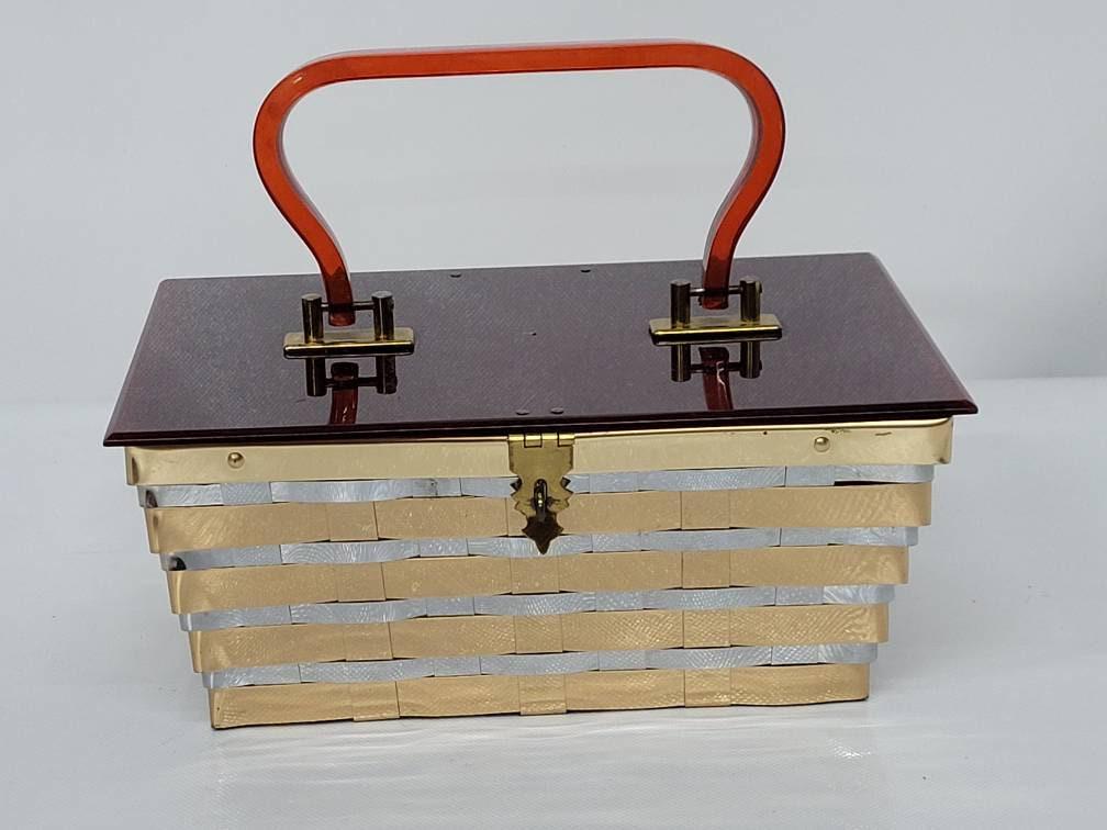 Mid Century Modern Purse Mod Stylish Hand Bag Brass Gold and Silver Chrome Brown Lucite Handle and: Vintage from the 1950s Materials: lucite Description Mid Century Modern Purse Mod Stylish Hand Bag Brass Gold and Silver Chrome Brown Lucite Handle and Lid Basket Weave Red Liner DORSET REX FIFTH AVEN