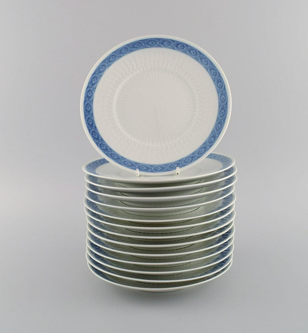14 Royal Copenhagen Blue Fan lunch plates. 1960s / 70s. Model number 1212/11521. Designed by Arnold: 14 Royal Copenhagen Blue Fan lunch plates. 1960s / 70s. Model number 1212/11521. Designed by Arnold Krog in 1909. Diameter: 20 cm. In excellent condition. Stamped. 1st factory quality. Reserve: $329.0