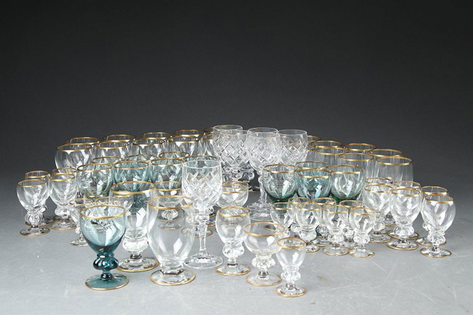 Jacob Bang for Holmegaard. A Collection of 'Gisselfeldt' glass.: Title: Jacob Bang for Holmegaard. A Collection of 'Gisselfeldt' glass. Description: Jacob Bang for Holmegaard. A Collection of 'Gisselfeldt' glass. A total of 63 mouth blown and gold gilded quality gl