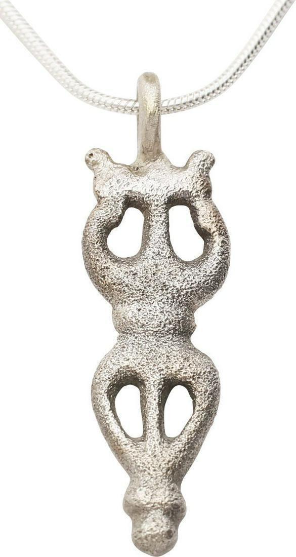 ROMAN WOMAN'S PENDANT NECKLACE: Silvered bronze, pierced openwork representing a lyre over a heart. Just over 1 3/8" length of delicate proportions. Both the lyre (yoke harp) and the cusped heart are images which the Romans inherite