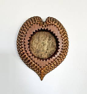 Heart Shaped Tramp Art Frame: Title: Heart Shaped Tramp Art Frame Additional Information: Rare tramp art heart shaped frame. In great shape. Circa 1920s Dimensions: 6" h x 4.5" w Shipping:Domestic: Flat-rate of $15.00 to