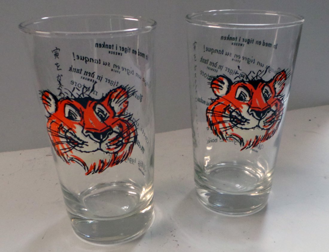 A pair of Vintage Esso/Exxon " Tiger In Your Tank" International Advert Glasses: A pair of Vintage Esso/Exxon " Tiger In Your Tank" International Advert Glasses - c. 1960's - Size: 5" H - Condition: good, no chips Shipping: Domestic: Flat-rate of $10.00 to anywhere within the cont