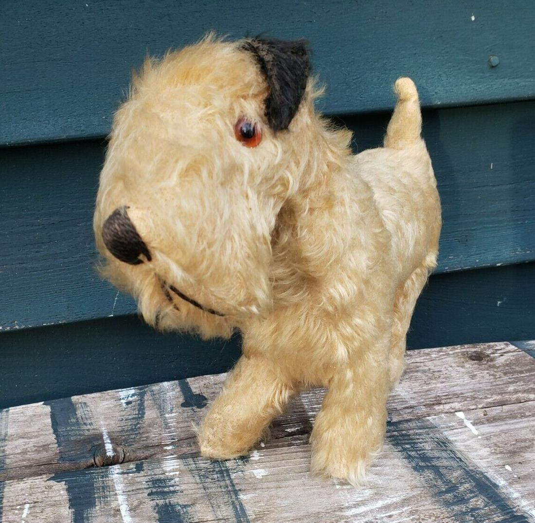 Steiff dog mohair 1950 or earlier excellent: Great looking piece in very good to excellent condition. Glass eyes. Not sure its steiff. Approximately 11" long and 9" tall. . Shipping costs include insurance. Shipping: Domestic: Flat-rate of $15.0