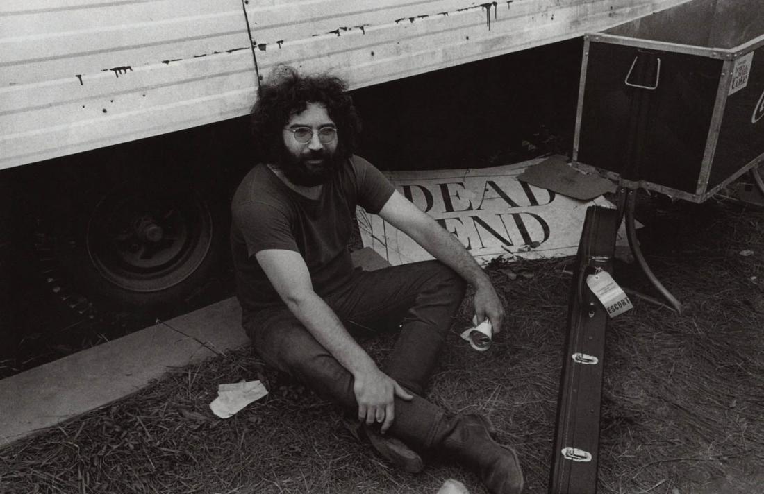 JIM MARSHALL - Jerry Garcia, “Dead end”, Woodstock, 1969: Artist: JIM MARSHALL Print Title: Jerry Garcia, “Dead end”, Woodstock, 1969 Printing Date: 1990’s Medium: Duotone Photo-lithograph Printed in: Italy Image Size: approx. 5.5 x 8”