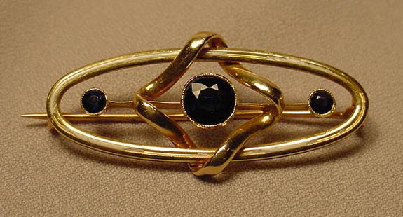 Antique Art Nouveau Sapphire 18K Brooch: Title: Antique Art Nouveau Sapphire 18K Brooch Additional Information: Exquisite antique 18K gold and sapphire Art Nouveau brooch. The sapphires are a deep natural blue color. The center sapphire