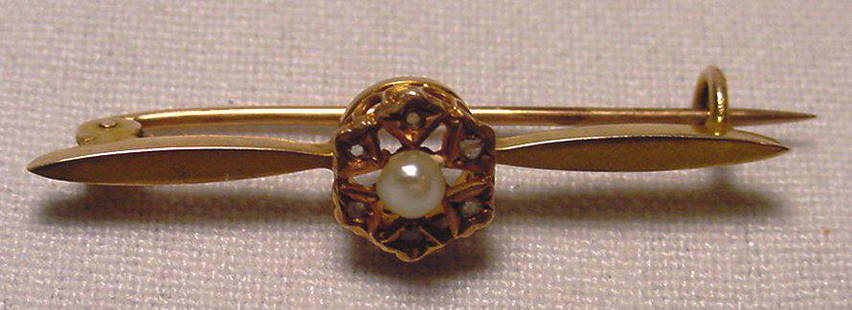 Lovely Art Nouveau Pearl Diamond Gold Brooch: Title: Lovely Art Nouveau Pearl Diamond Gold Brooch Additional Information: Beautiful antique Art Nouveau 14K gold pearl and diamond brooch. Length 1 inch. Width 5/16 inch. Weight 1.6 grams.