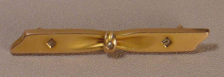 Antique Art Deco 12K Gold & Diamond Pin: Title: Antique Art Deco 12K Gold & Diamond Pin Additional Information: Beautiful antique 12K gold and 3 old rose cut diamonds Art Deco pin. Weight 3.4 grams. Length 2 inches. Height 1/4 inch. This