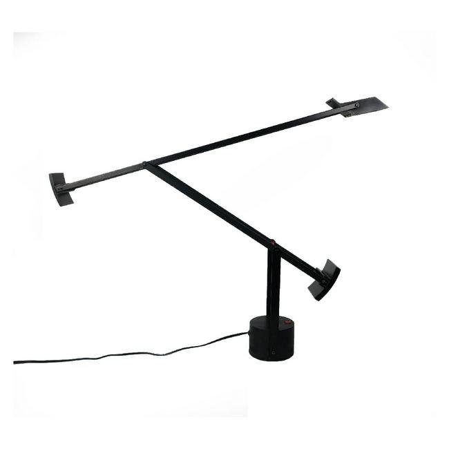 Vintage Tizio Lamp by Richard Sapper for Artemide: Designed by Richard Sapper for Artemide in 1972, the Tizio lamp is a true classic of modern design. Built with two counterweights to allow the user to direct the light where it's needed, the lamp adju