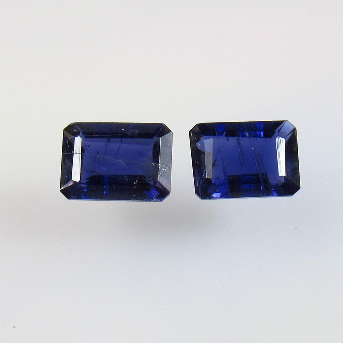 1.56 Ct Natural Iolite Octagon Pair: No Reserve! Title:1.56 Ct Natural Iolite Octagon Pair Stone Clarity:Semi-Transparent Gemstones:Natural Iolite Carat Weights:1.56 Size/Dimensions:7.00 x 5.00 x 3.10 mm / 2 P'cs Additional Information:V