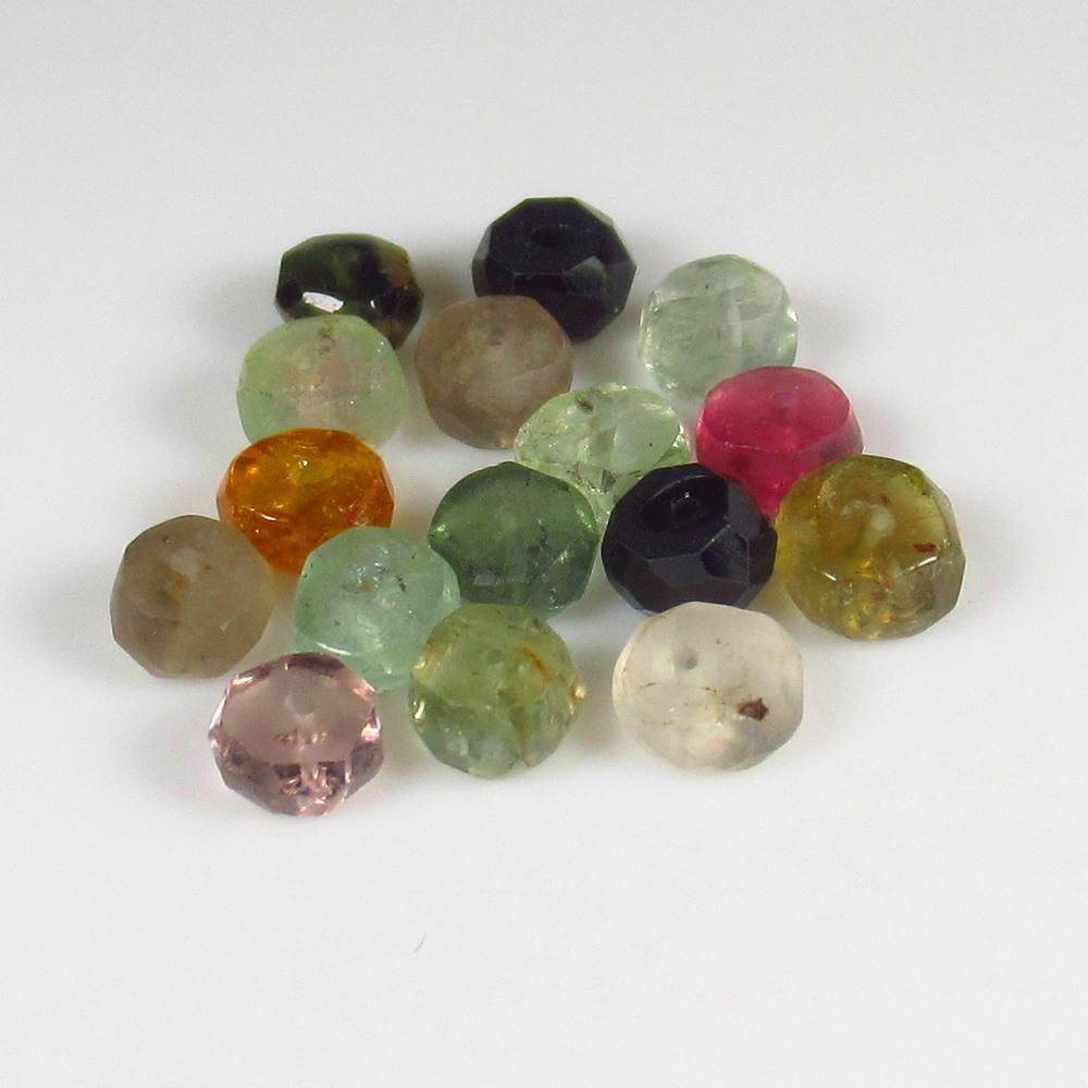 Natural Tourmaline Beads - 26.63 Ct: No Reserve! Title: Natural Tourmaline Beads - 26.63 Ct Origin: Mozambique Weight: 26.63 Size/Dimensions: 4.5 - 5.0 mm Additional Information: Pieces : 16 No's / Shape : Drilled Round Beads / Color : M