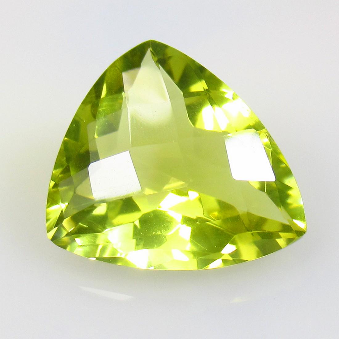 10.78 Ctw Natural Lemon Quartz Trillion Cut: No Reserve! Title:10.78 Ctw Natural Lemon Quartz Trillion Cut Stone Clarity:VVS Gemstones:Natural Lemon Quartz Carat Weights:10.78 Size/Dimensions:16.70 x 15.10 x 8.50 mm Additional Information:Good L