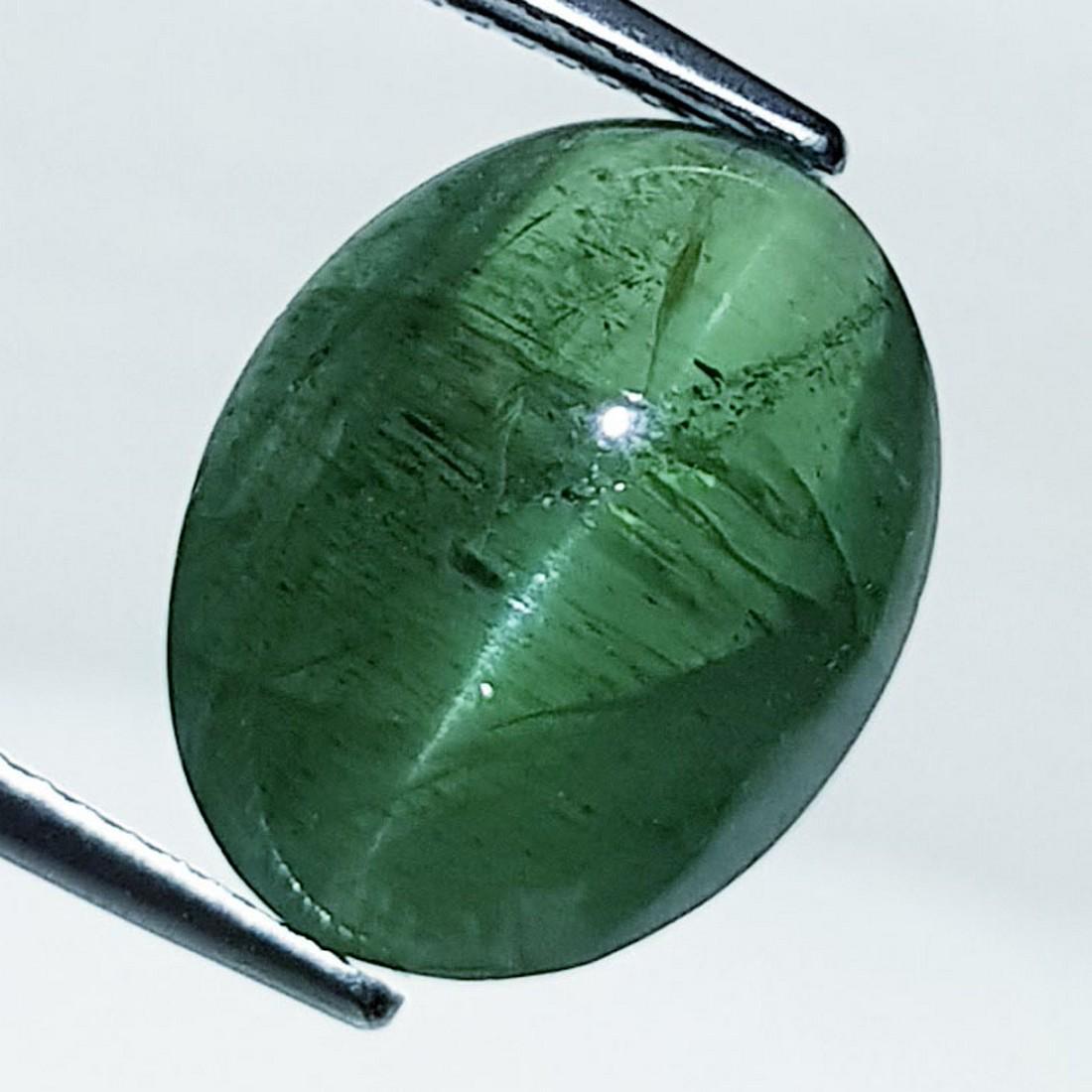 13.21 ctz" Rare Alexandrite Green" Natural Apatite Cat's Eye: No Reserve! Title: 13.21 ctz" Rare Alexandrite Green" Natural Apatite Cat's Eye Color/Clarity: Alex Green / Transparant Gemstones: Apatite Carat Weights: 13.21 Size/Dimensions: 15.50 x 12.00 x 8.50 Ad