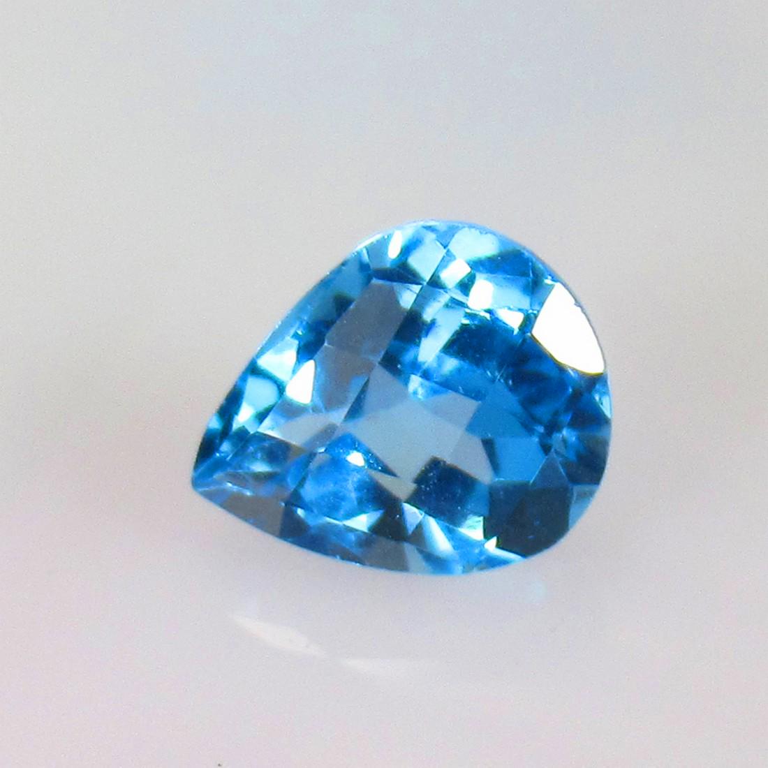 3.30 Ctw Natural Blue Topaz Pear Cut: No Reserve! Title:3.30 Ctw Natural Blue Topaz Pear Cut Stone Clarity:VVS Gemstones:Natural Blue Topaz Carat Weights:3.3 Size/Dimensions:10.20 x 8.20 x 6.00 mm Additional Information:Excelent Pear Cut 
