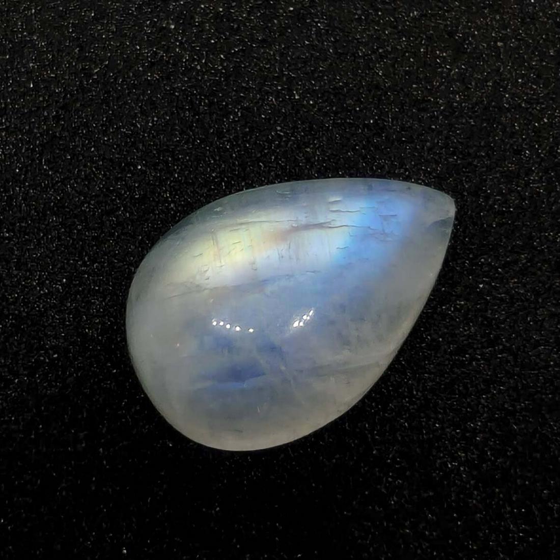 4.65 ct Natural White Rainbow Moonstone: No Reserve! Title: 4.65 ct Natural White Rainbow Moonstone Additional Information: Gemstones: Rainbow Moonstone Carat Weights: 4.65 ct Size/Dimensions:13 X 9 X 5 mm Origin : India Materials & Techniqu
